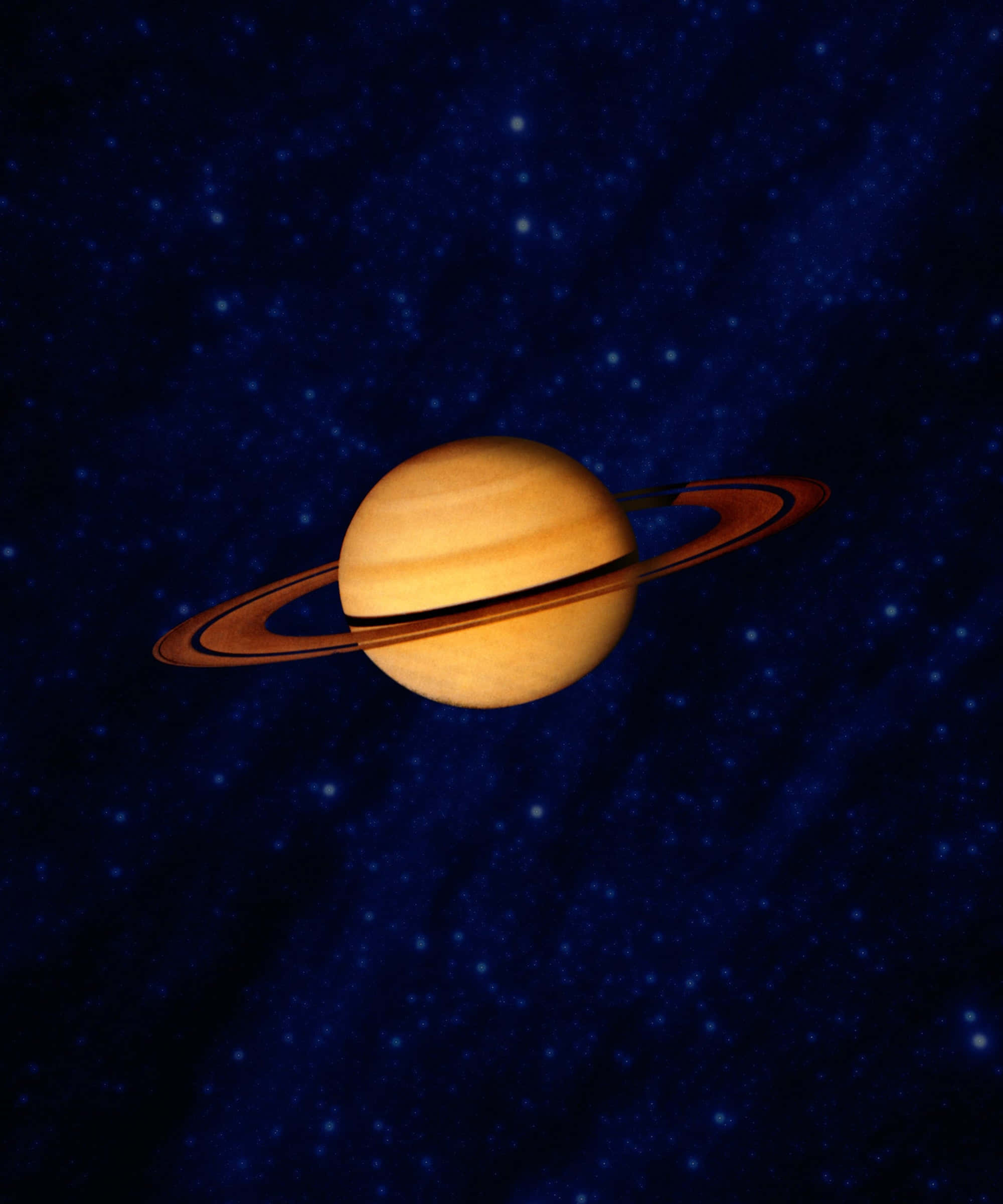 土星 桌布 壁紙 — 宏偉的土星及其標誌性的光環在深邃的星空夜空中溫暖地發光。