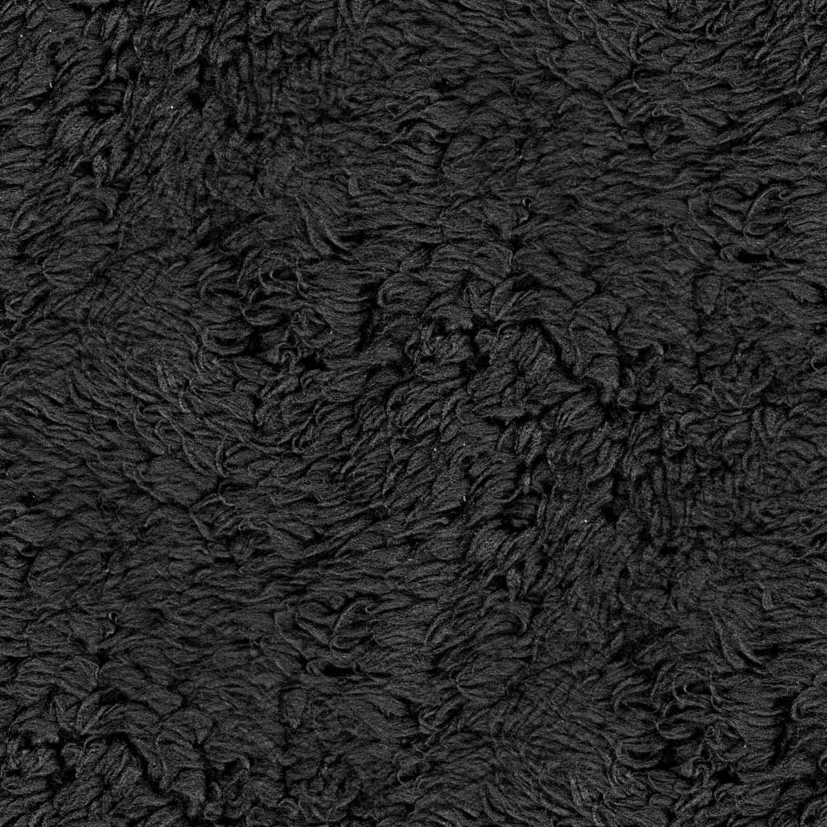 seamless 桌布 壁紙 — 密集黑色長毛地毯纖維的特寫，營造出柔軟的紋理表面。