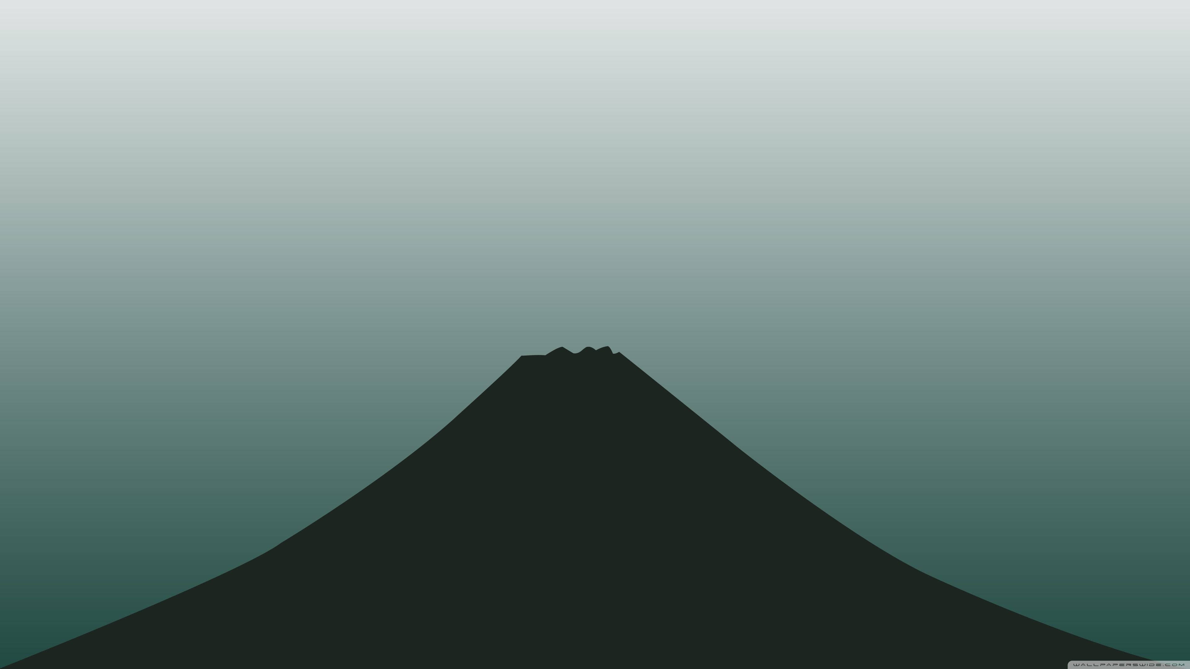 極簡動態 桌布 壁紙 — 富士山的極簡剪影在漸變青綠色的天空中升起，喚起寧靜的靜止感。