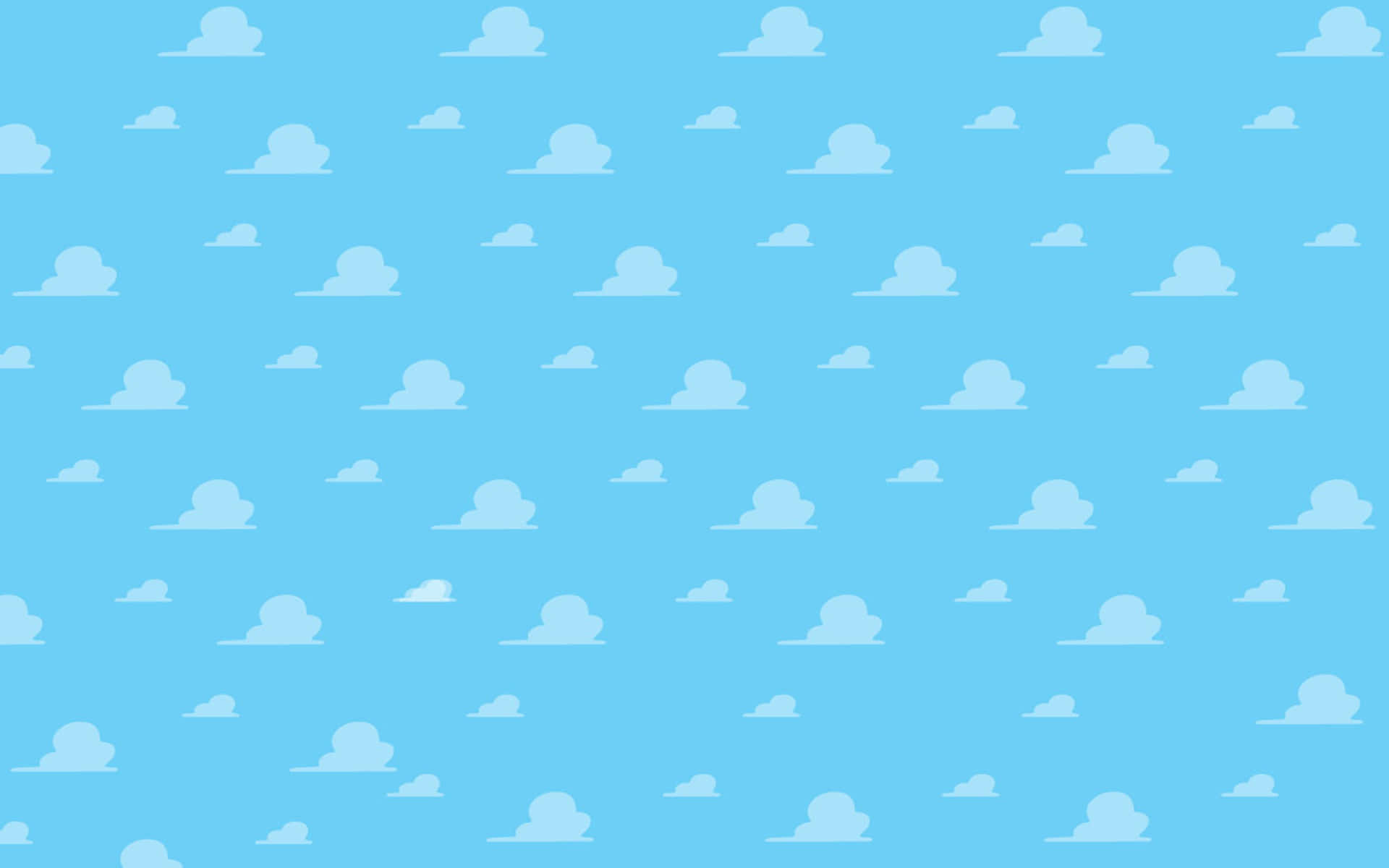 Toy Story Cloud 桌布 壁紙 — 寧靜的天空充滿柔軟的白雲，背景是平靜的淺藍色。