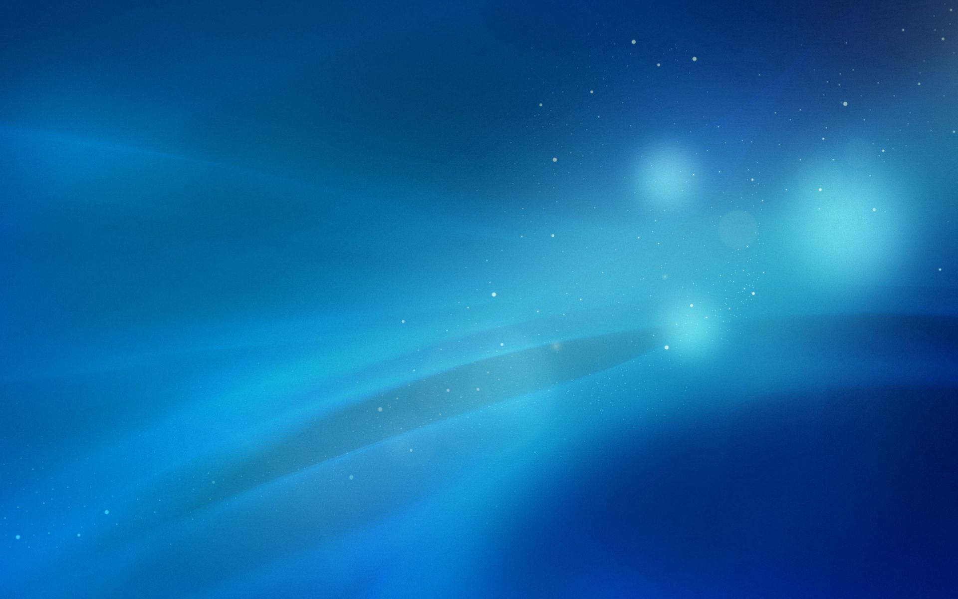 藍色 桌布 壁紙 — 寧靜的宇宙場景，深藍色漸變天空中閃耀著藍色星雲和散落的星星。