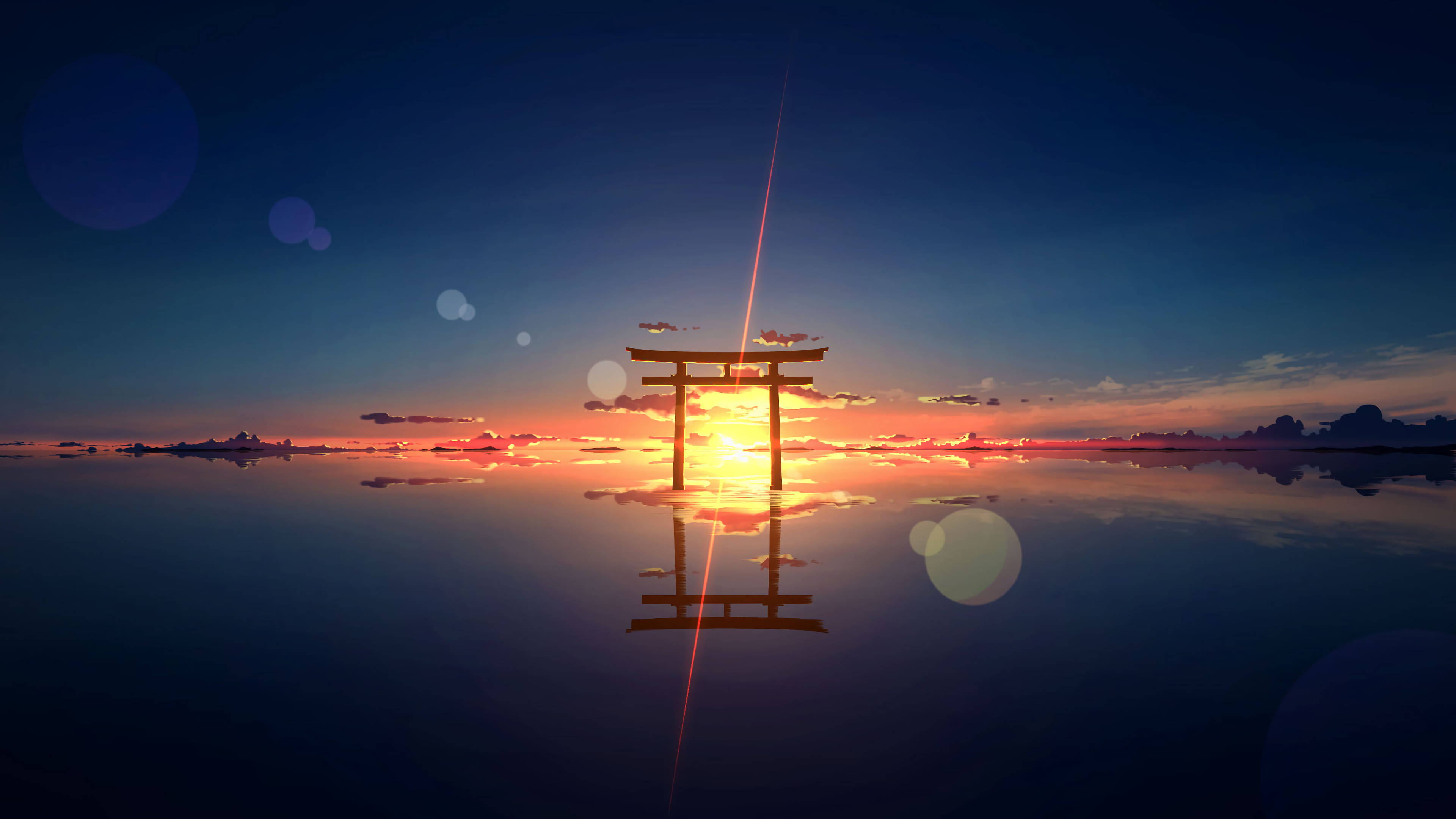 Torii 桌布 壁紙 — 寧靜的日落，傳統日本鳥居矗立在平靜的水面上，倒映著火紅的天空和鏡頭光暈。