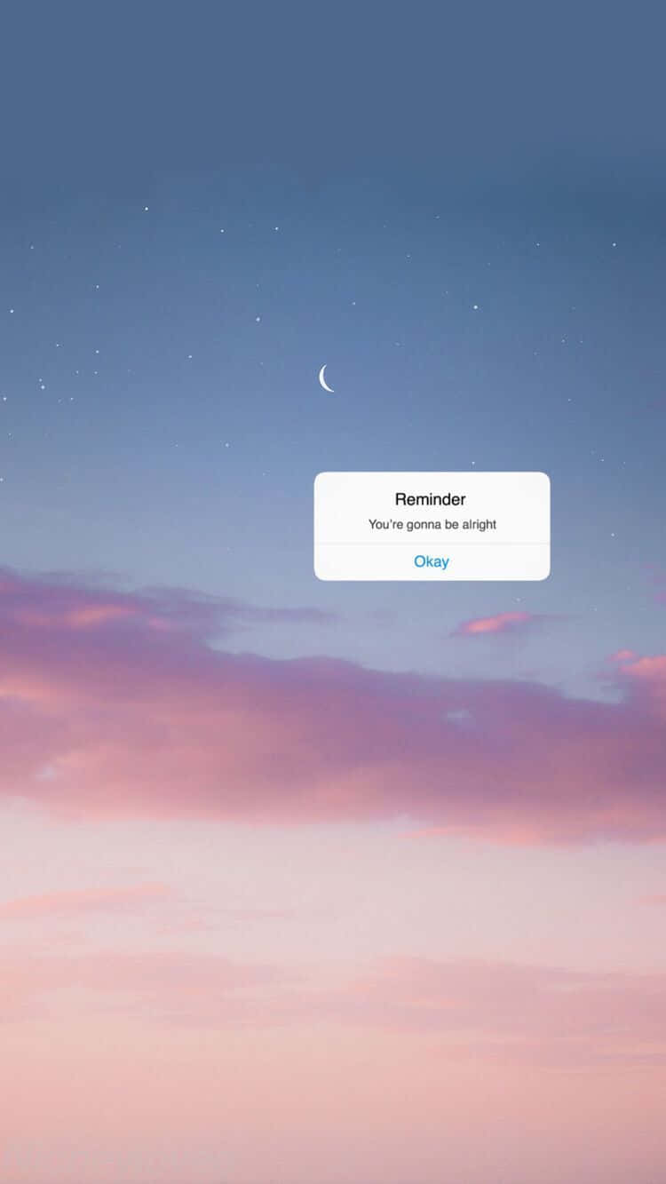 Aesthetic Reminder 桌布 壁紙 — 寧靜的暮色天空，粉紅色的雲朵和一彎新月，有一個漂浮的提醒框寫著「你會沒事的」。
