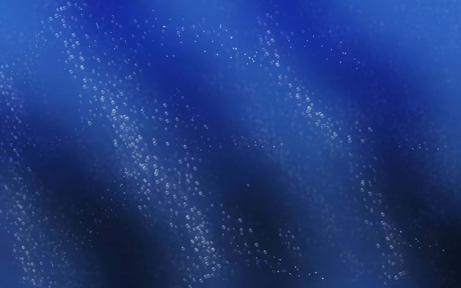 水 桌布 壁紙 — 寧靜的水下場景，帶有發光的藍色漸變和向上飄浮的氣泡。