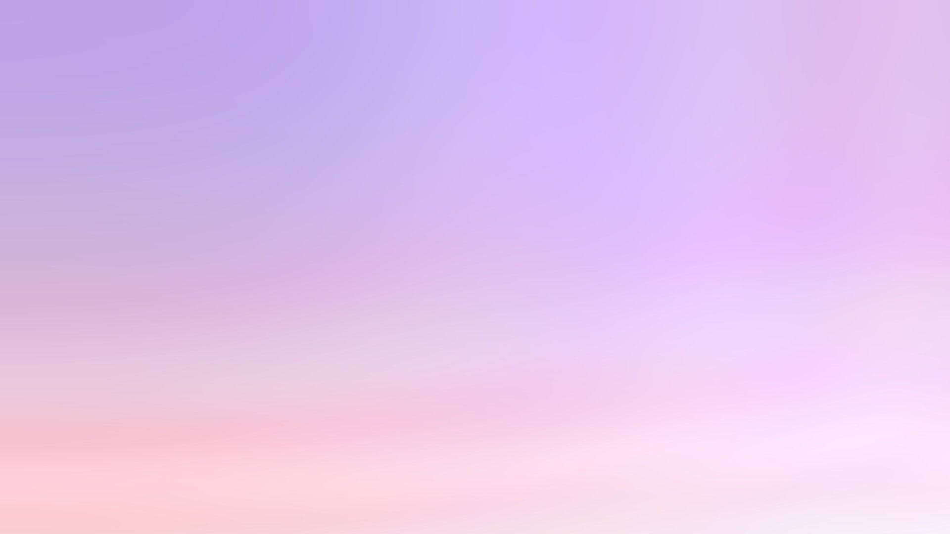 美學 桌布 壁紙 — 寧靜的漸層天空，融合柔和的薰衣草和淡粉紅色調，營造夢幻般的粉彩氛圍。