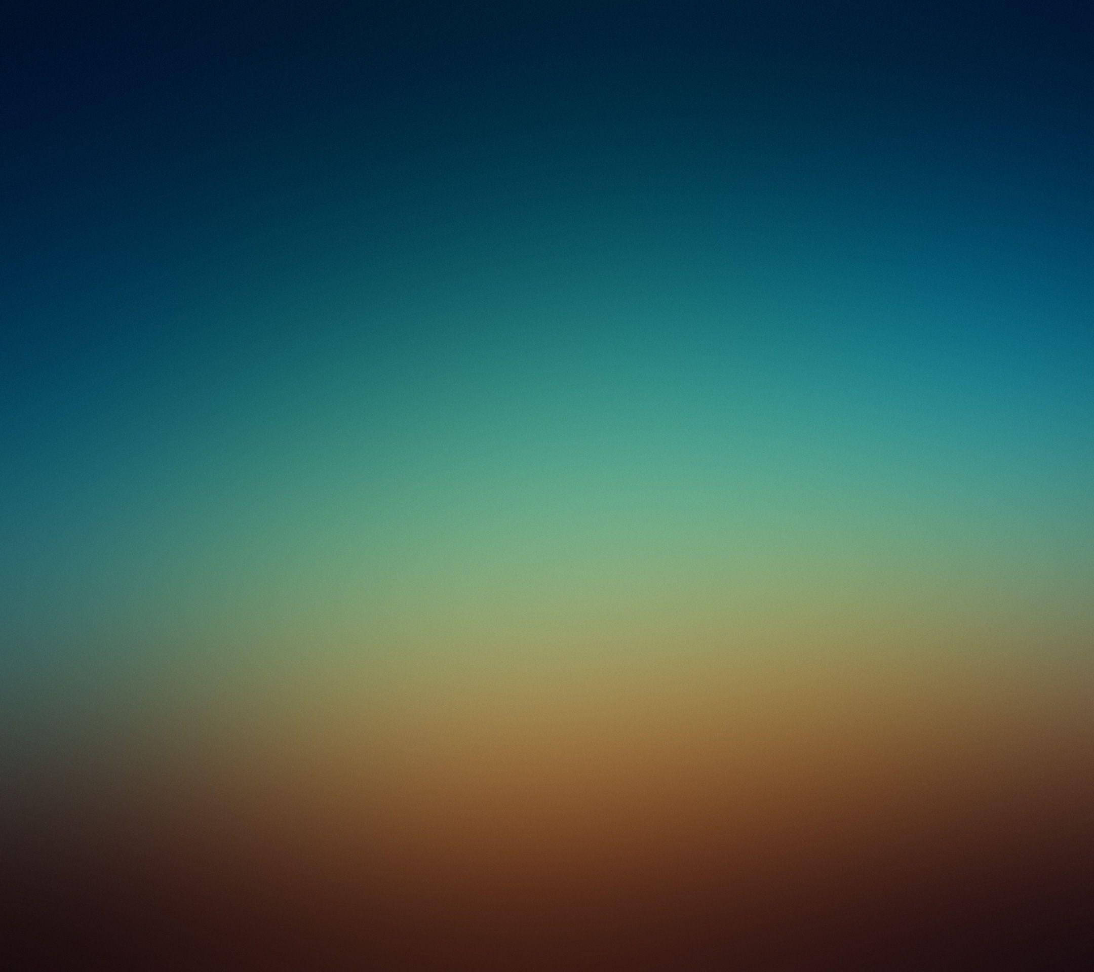 Xiaomi 桌布 壁紙 — 寧靜的漸變天空從深藍綠色過渡到溫暖的琥珀色，喚起寧靜的暮色地平線。