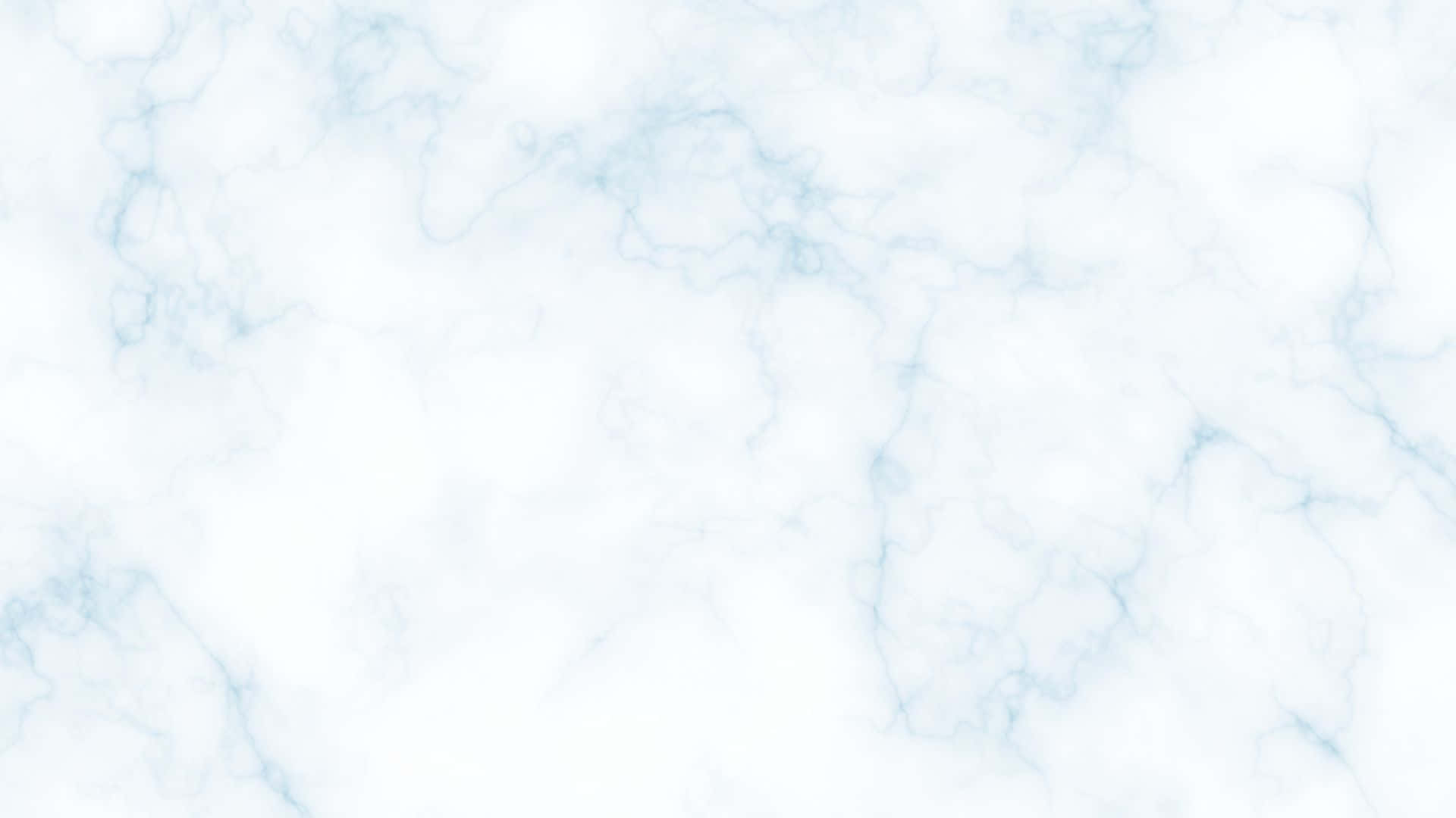 Blue Marble 桌布 壁紙 — 寧靜的白色大理石表面，帶有精緻的淺藍色紋理，營造出優雅的自然圖案。
