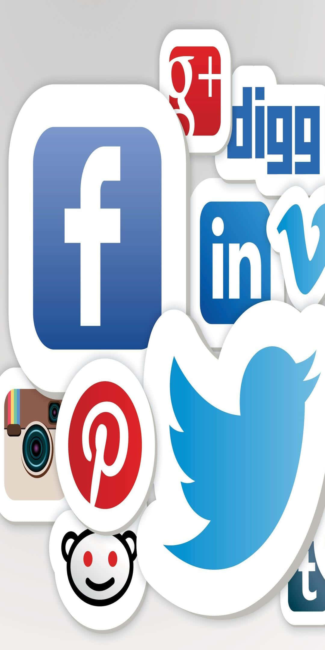Social 桌布 壁紙 — 將Facebook、Twitter和Instagram等熱門社交媒體應用程式圖標拼貼在淺灰色背景上。