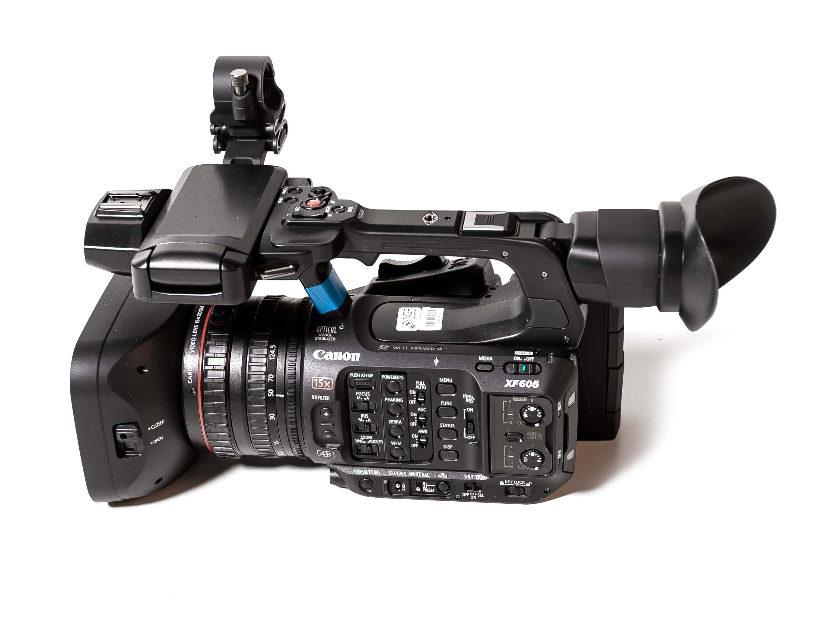 影片 桌布 壁紙 — 專業黑色Canon XF605攝影機，配備鏡頭及配件，在工作室燈光下以白色背景展示。