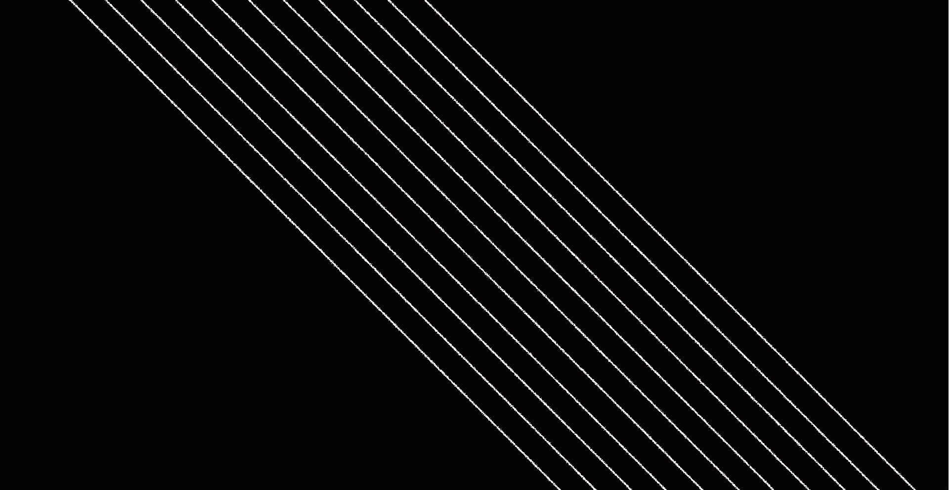 Black And White Striped 桌布 壁紙 — 對角白色線條在純黑色背景上劃過，營造出極簡幾何圖案。