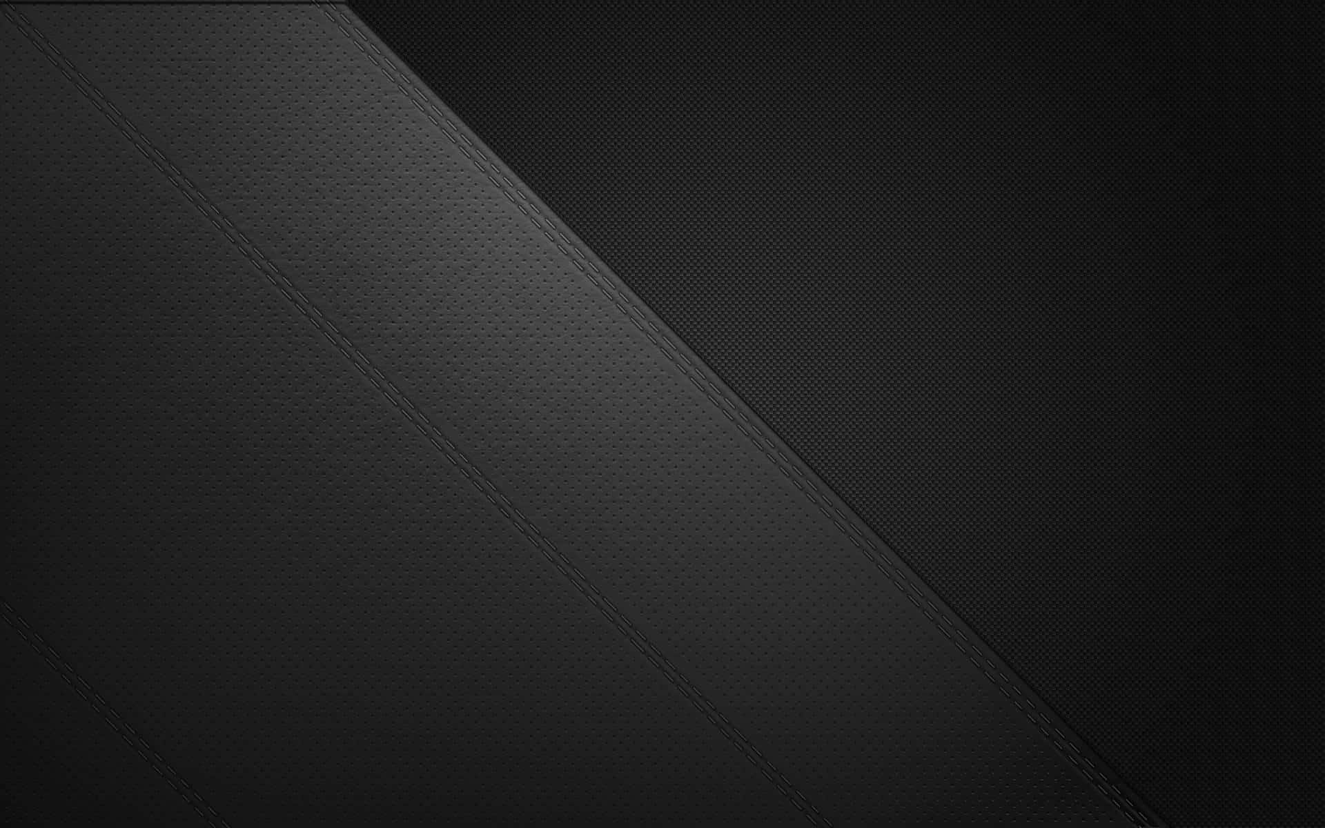 Material Design 桌布 壁紙 — 對角黑色皮革面板搭配縫合接縫，營造出時尚簡約的質感。