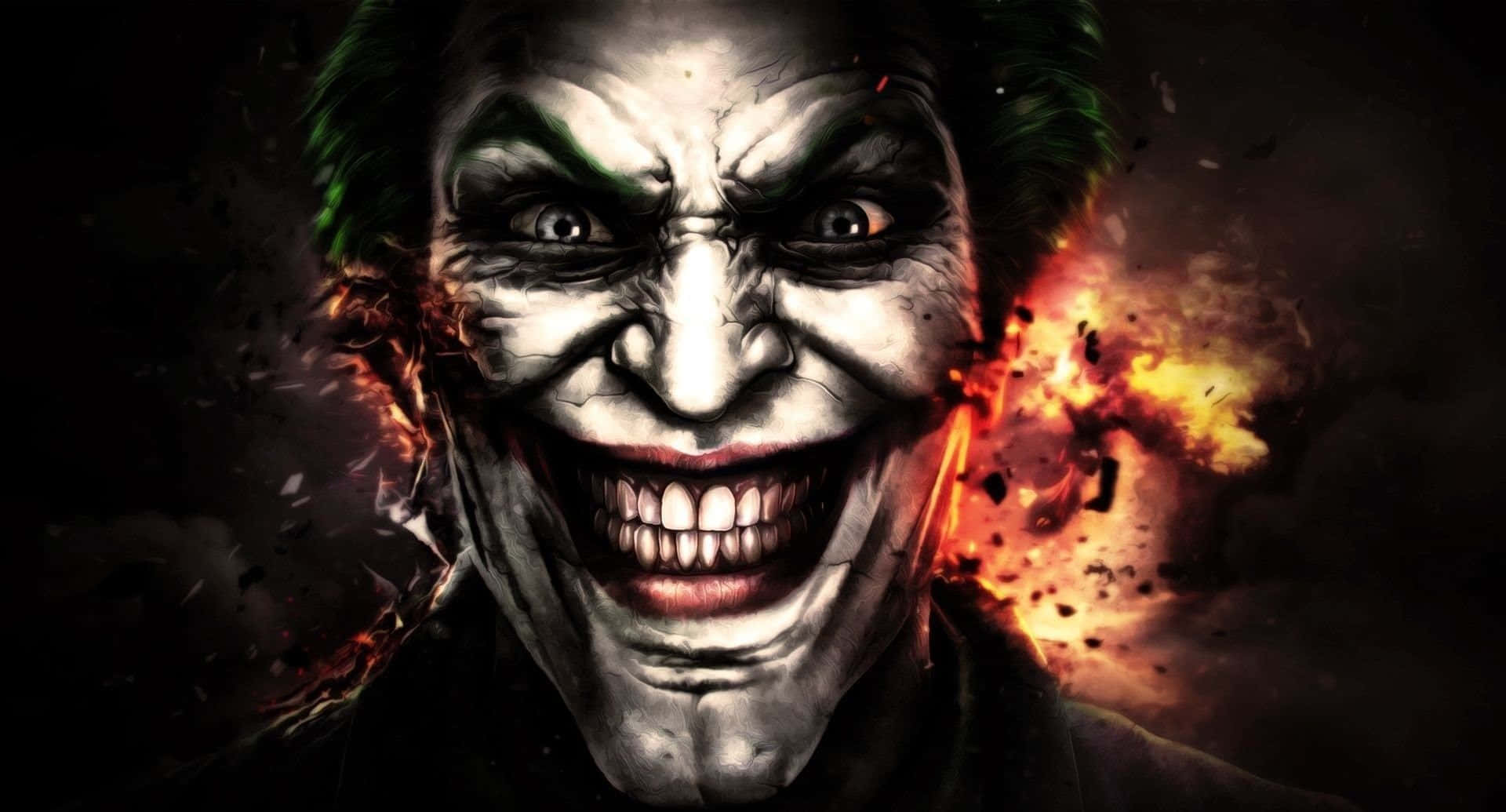 Evil Joker 桌布 壁紙 — 小丑的近距離威脅特寫，咧嘴大笑，綠髮，背景是熾熱的爆炸。
