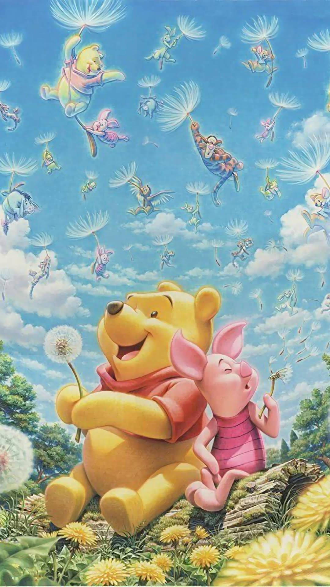 Piglet 桌布 壁紙 — 小熊維尼和小豬開心坐在被蒲公英包圍的木頭上，而他們的朋友在明亮的藍天下隨著蒲公英的絨毛飄走。