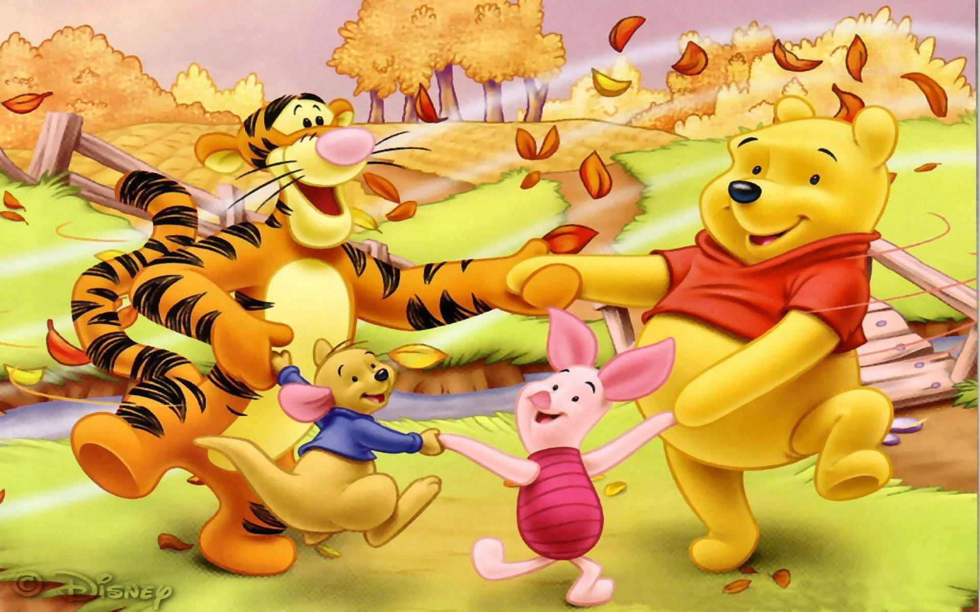 Tigger 桌布 壁紙 — 小熊維尼和朋友們在充滿活力的秋日草地上快樂地跳舞，伴隨著落葉和溫暖的金色光芒。