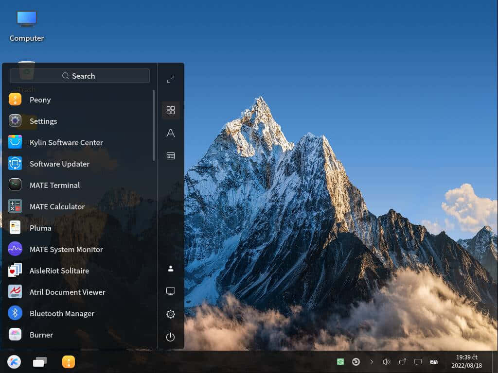 ubuntu 桌布 壁紙 — 尖銳的雪山山峰刺穿清澈的藍天，金色的陽光突出其崎嶇的山脊和下方旋轉的雲層。