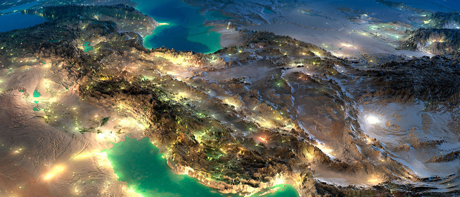 Tehran 桌布 壁紙 — 崎嶇沙漠景觀的夜間鳥瞰圖，閃爍的城市燈光和藍綠色的水域。
