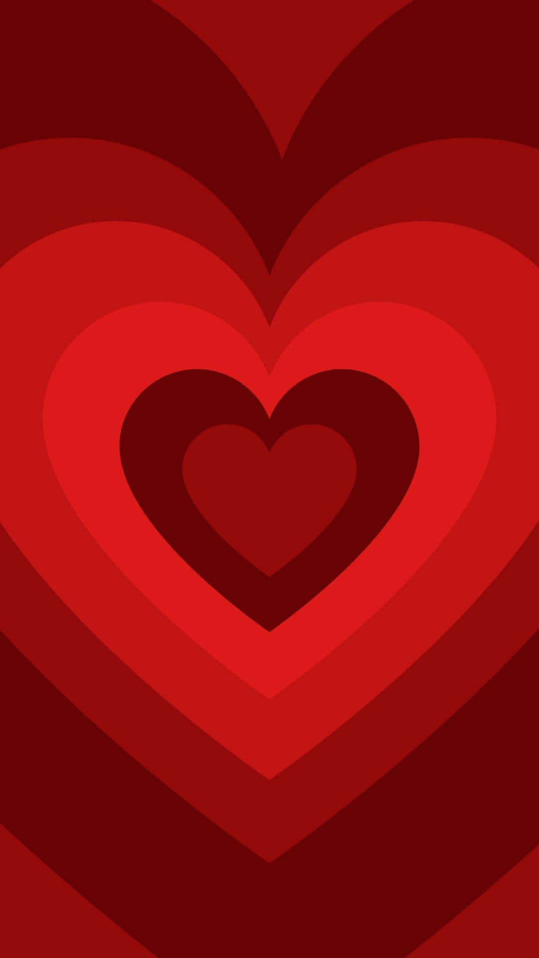 Red Heart 桌布 壁紙 — 嵌套的同心心形以漸變紅色色調營造出分層的浪漫視覺效果。