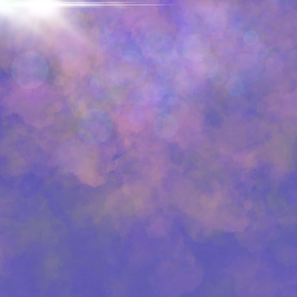 Purple Haze 桌布 壁紙 — 左上角帶有明亮太陽眩光的柔和紫色和藍色散景燈光。