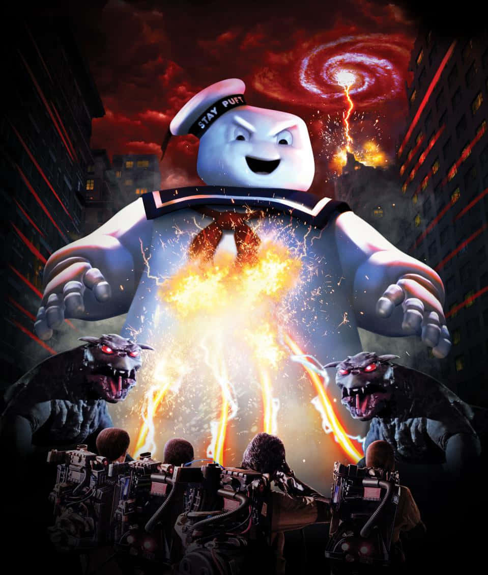 魔鬼剋星 桌布 壁紙 — 巨型 Stay Puft 棉花糖人聳立於城市之上，魔鬼剋星在火紅的天空下將質子背包對準他。