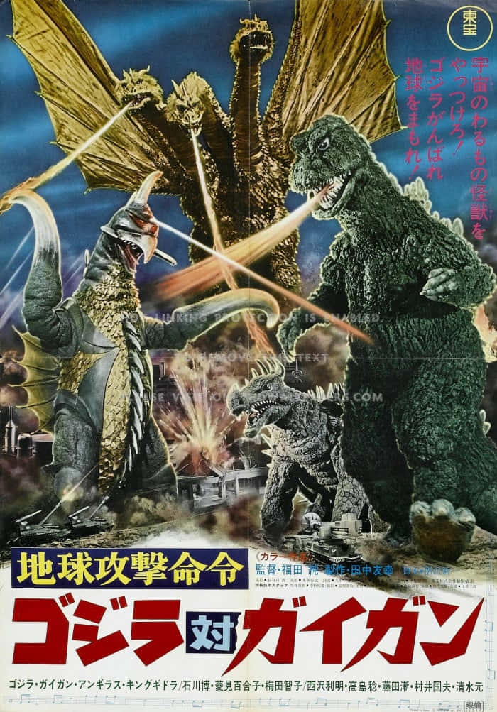 Gigan 桌布 壁紙 — 巨型怪獸哥吉拉與王者基多拉在燃燒的城市景觀上空交戰，經典日本怪獸電影海報。