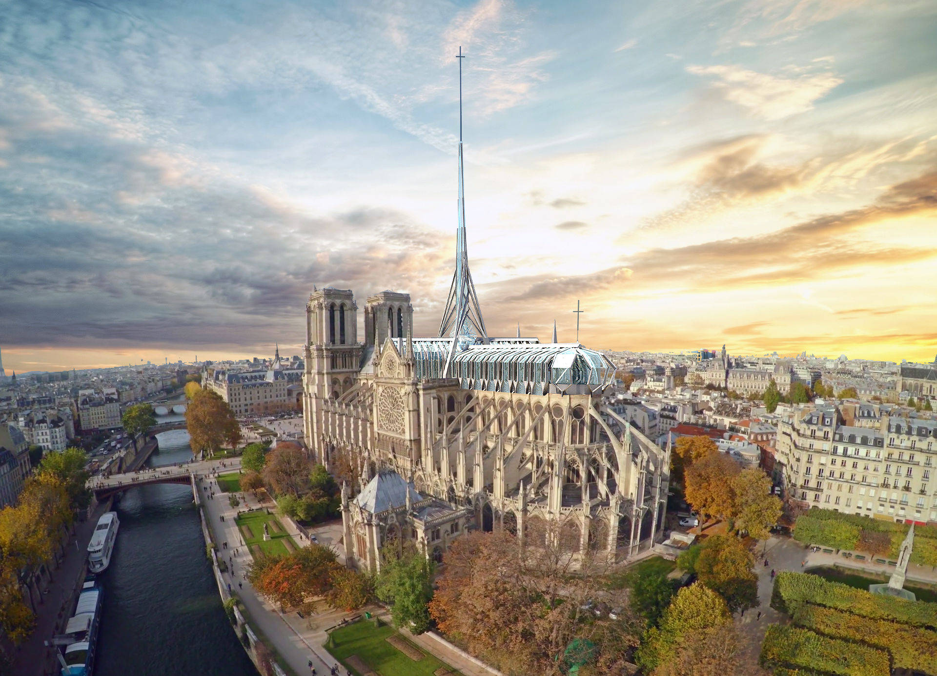 Notre Dame 桌布 壁紙 — 巴黎聖母院的鳥瞰圖，夕陽西下，秋樹環繞，塞納河在下方流淌。
