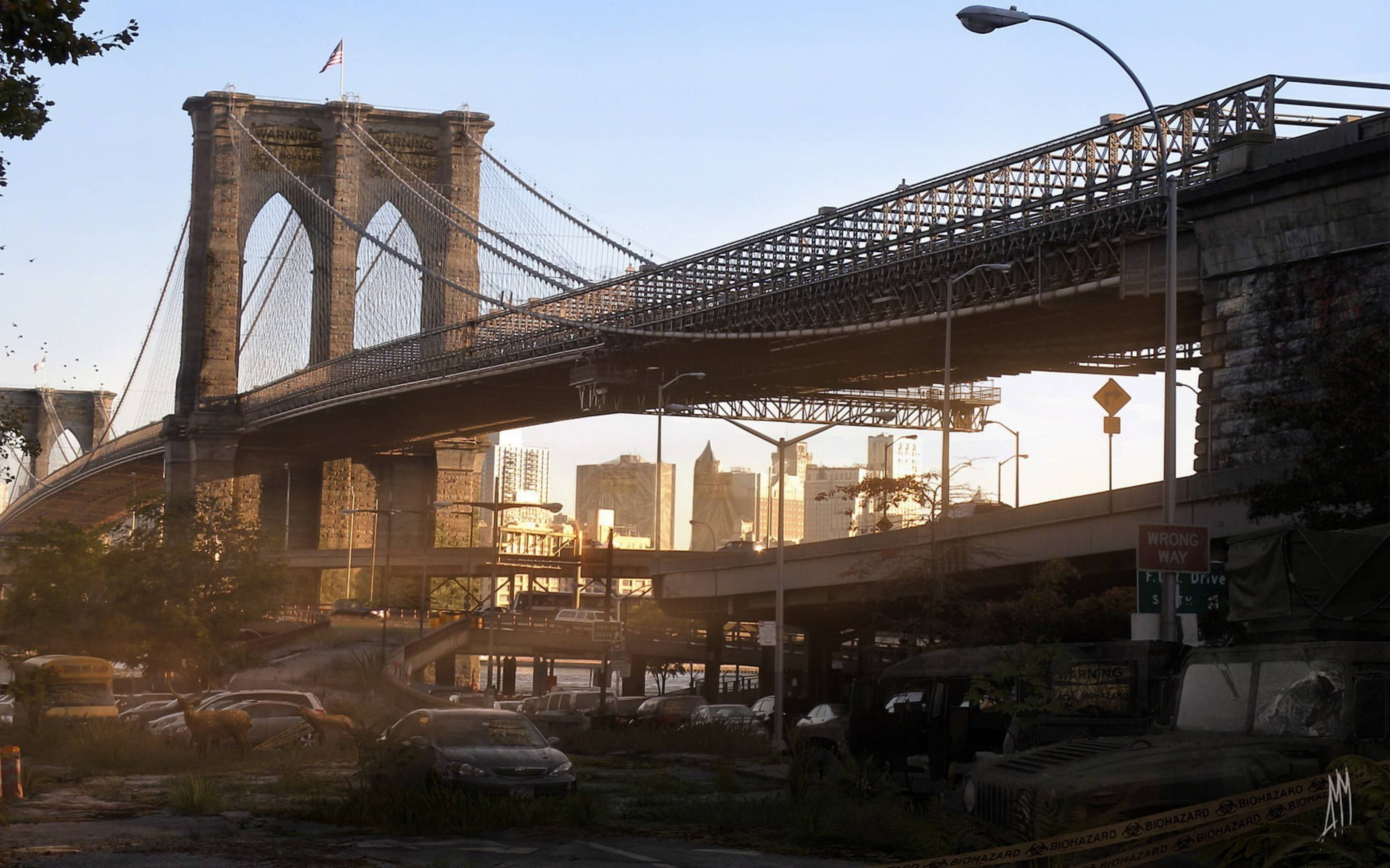 New York 桌布 壁紙 — 布魯克林大橋聳立在陽光普照的城市景觀之上，橋拱下有汽車和塗鴉。