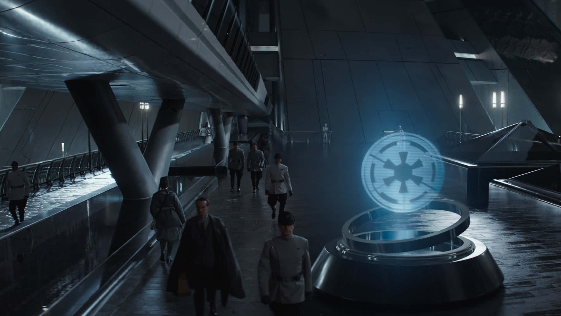 Kamino 桌布 壁紙 — 帝國軍官大步穿過昏暗的未來風格大廳，發光的死星標誌懸浮在基座上方。