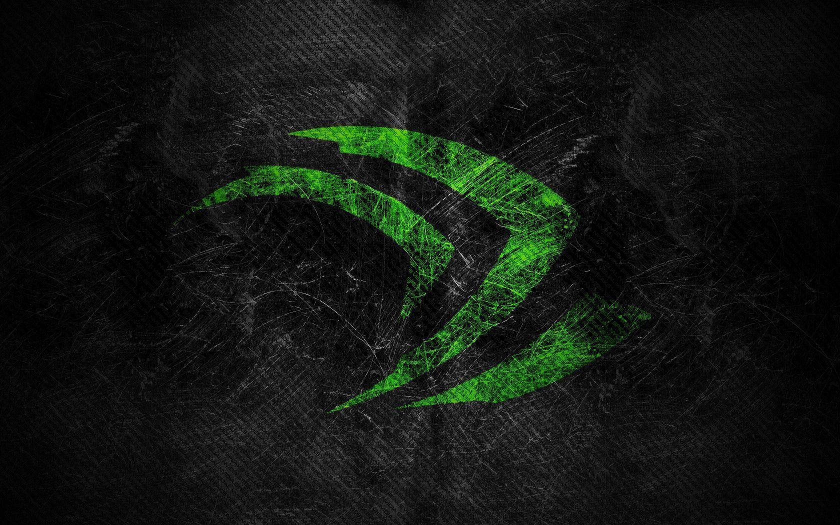 nvidia 桌布 壁紙 — 帶有刮痕紋理的發光綠色NVIDIA標誌在黑暗粗糙的背景中脫穎而出。