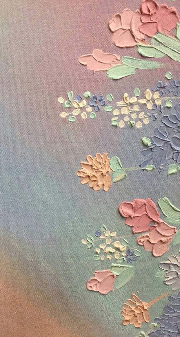 Pastel Vintage iPhone 桌布 壁紙 — 帶有厚塗筆觸的紋理花卉畫作，在畫布上呈現柔和的粉紅、綠色和藍色色調。