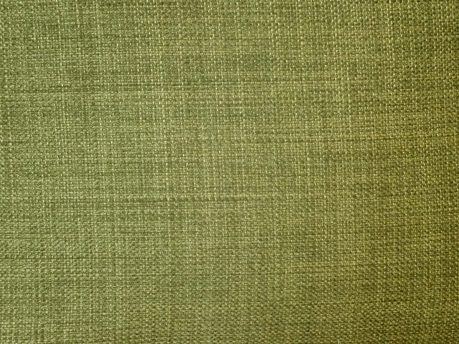 Olive Green 桌布 壁紙 — 帶有可見編織線和細微顏色變化的紋理橄欖綠色織物特寫。