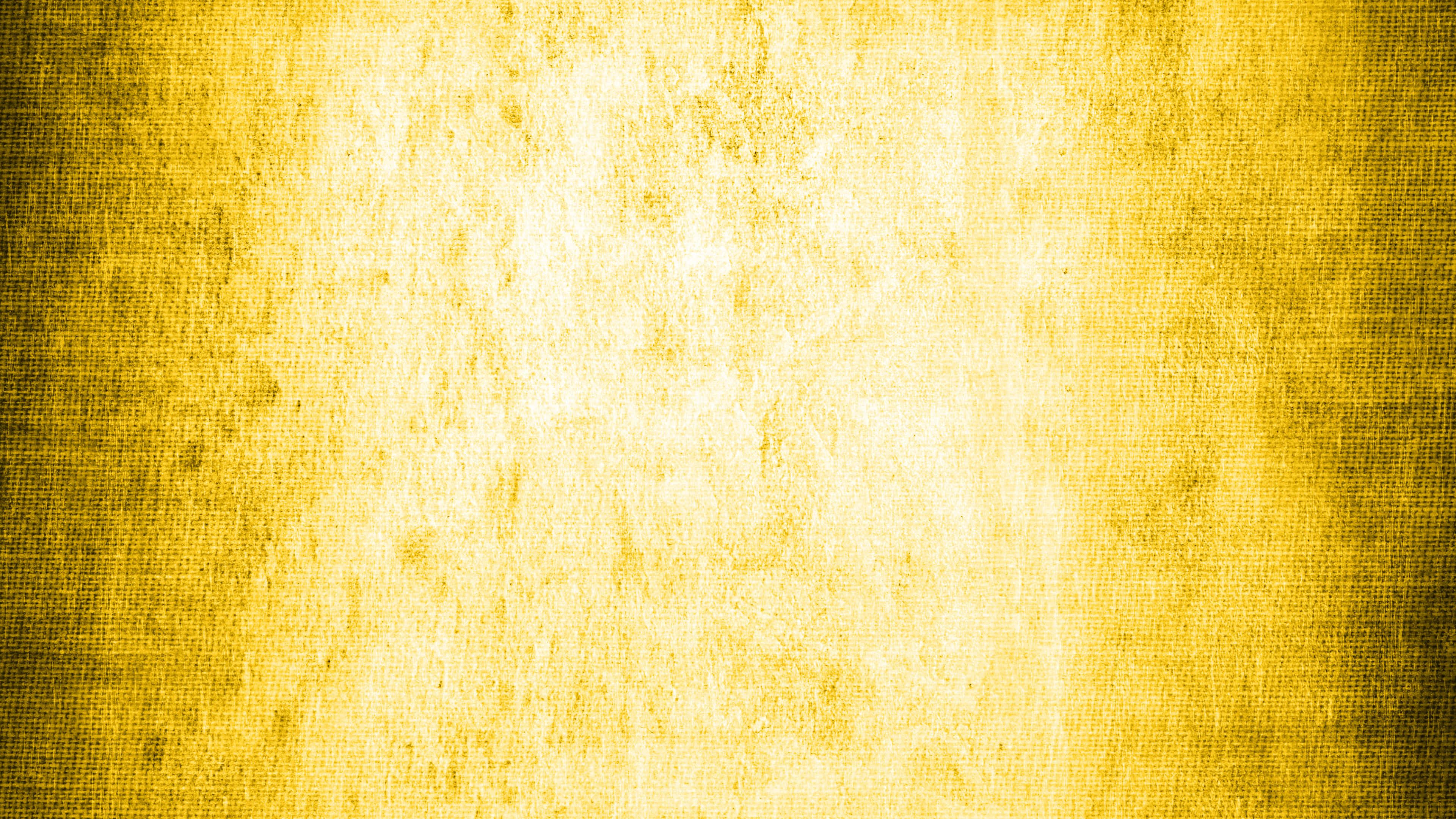 Yellow Grunge 桌布 壁紙 — 帶有微妙漸變和磨損邊緣的紋理金黃色織物背景。