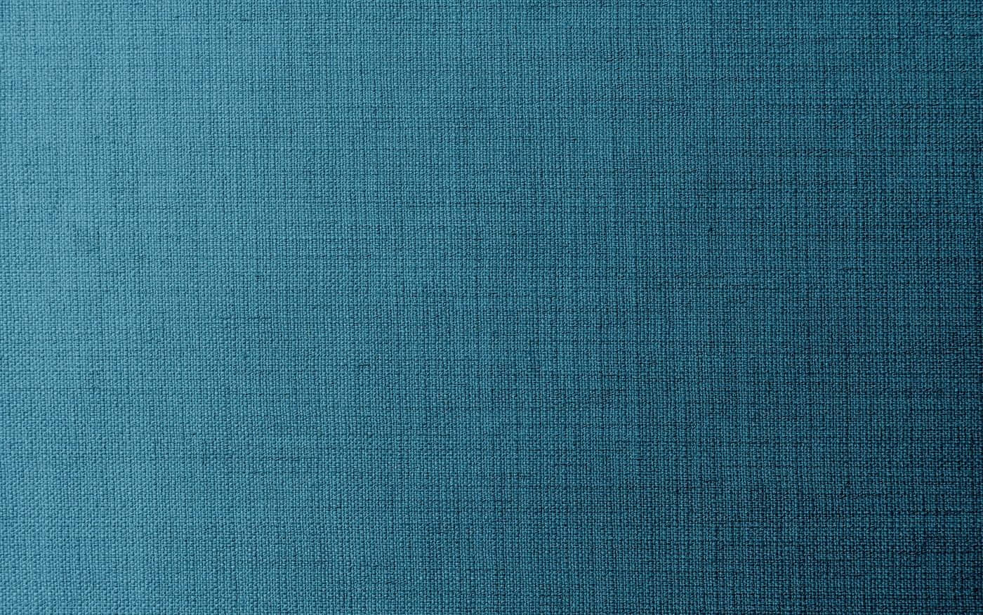 Fabric 桌布 壁紙 — 帶有微妙漸變和編織圖案的紋理青綠色布料的特寫。