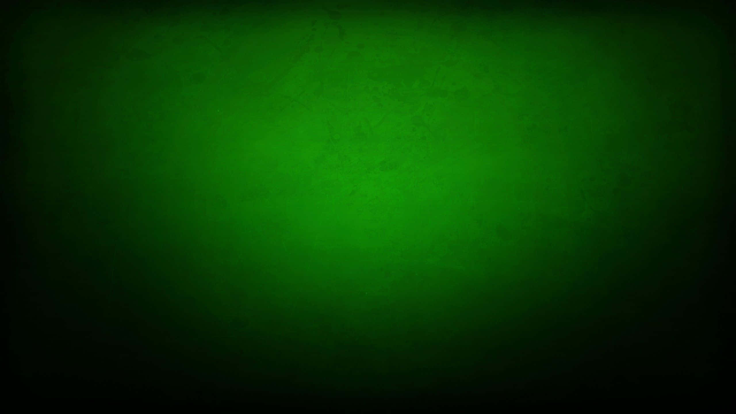 桌布 壁紙 — 帶有深色暈影和細微紋理的漸變綠色背景，從深綠色漸變到亮綠色。