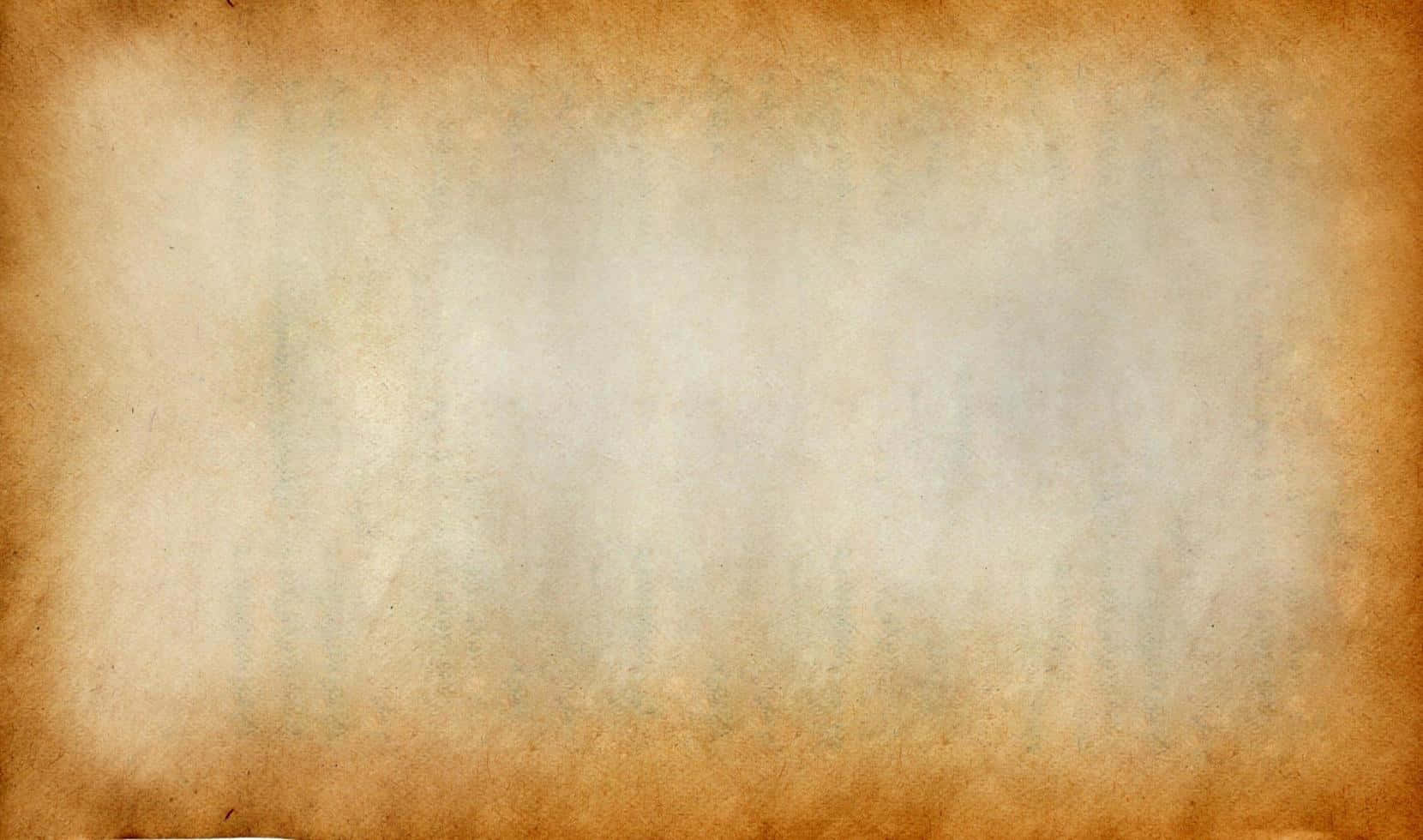 texture 桌布 壁紙 — 帶有溫暖棕色邊緣和褪色中心的有紋理復古羊皮紙，非常適合歷史文檔或幻想背景。