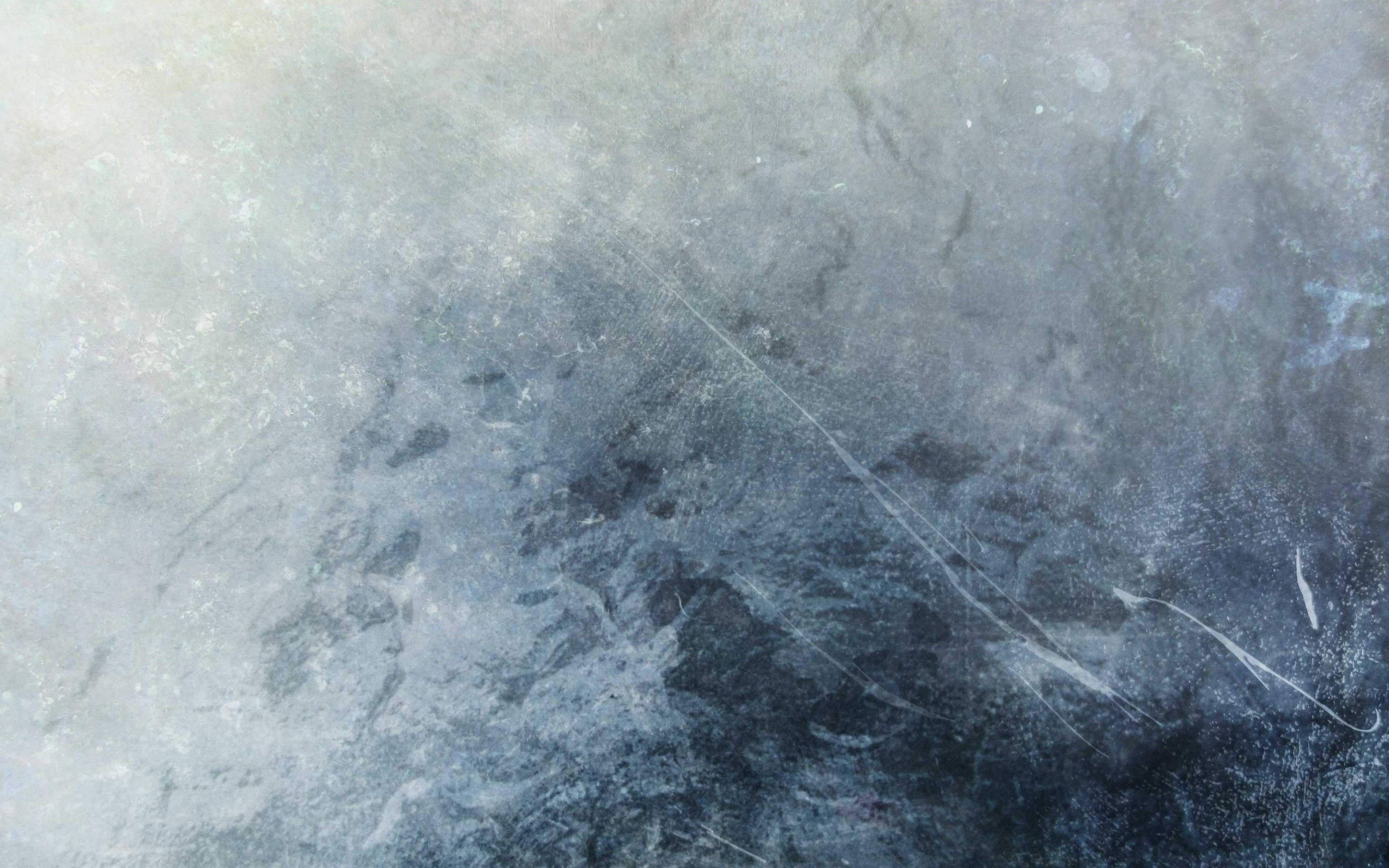Textured 桌布 壁紙 — 帶有漩渦狀灰、藍、白色調的紋理抽象表面，類似霜或老化混凝土。