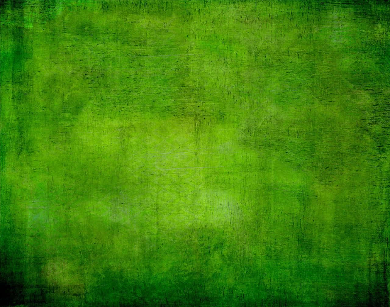 翡翠綠 桌布 壁紙 — 帶有漸變色調和細膩筆觸圖案的紋理綠色抽象背景。