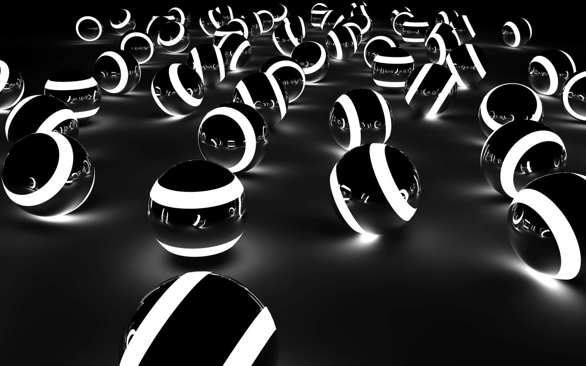 Aesthetic Black And White 桌布 壁紙 — 帶有發光白色帶的光澤黑色球體漂浮在黑暗虛空中，投射出柔和反射。