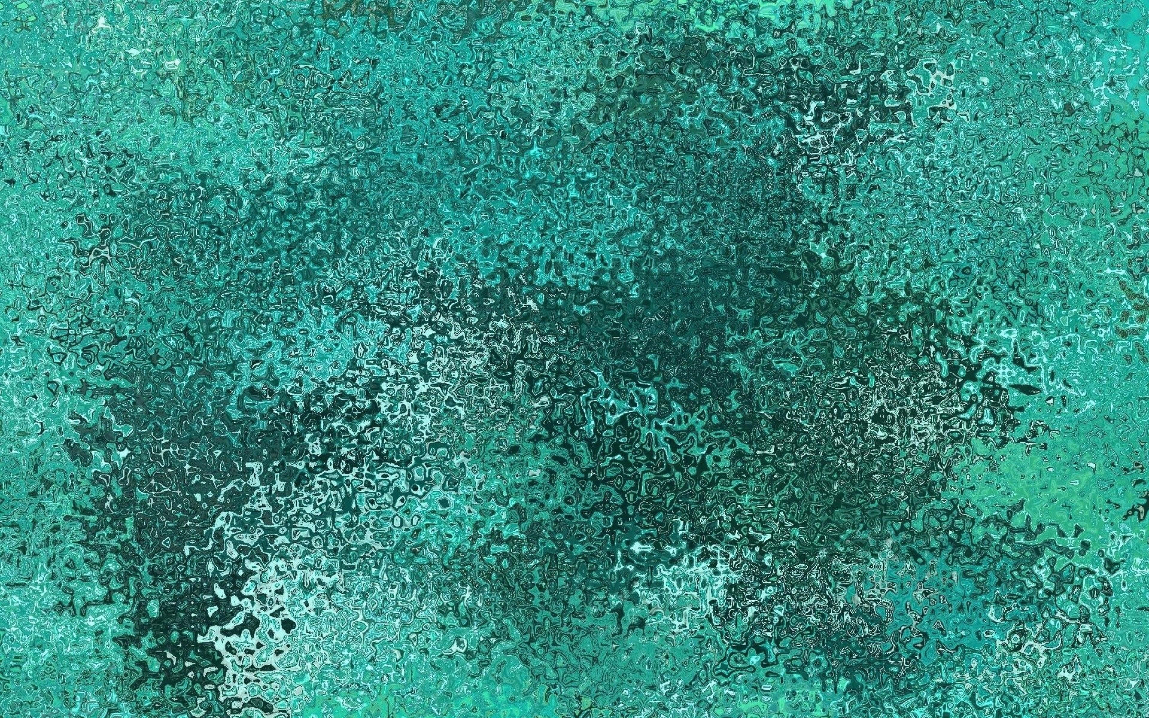 桌布 壁紙 — 帶有紋理的抽象圖案，採用青綠色和深綠色，呈現漩渦狀有機形狀和斑點高光。