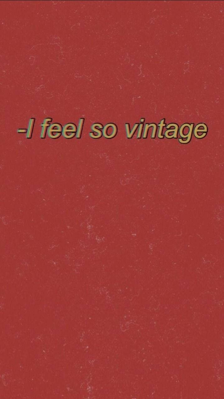 在帶紋理的紅色背景上顯示「I feel so vintage」的復古文字