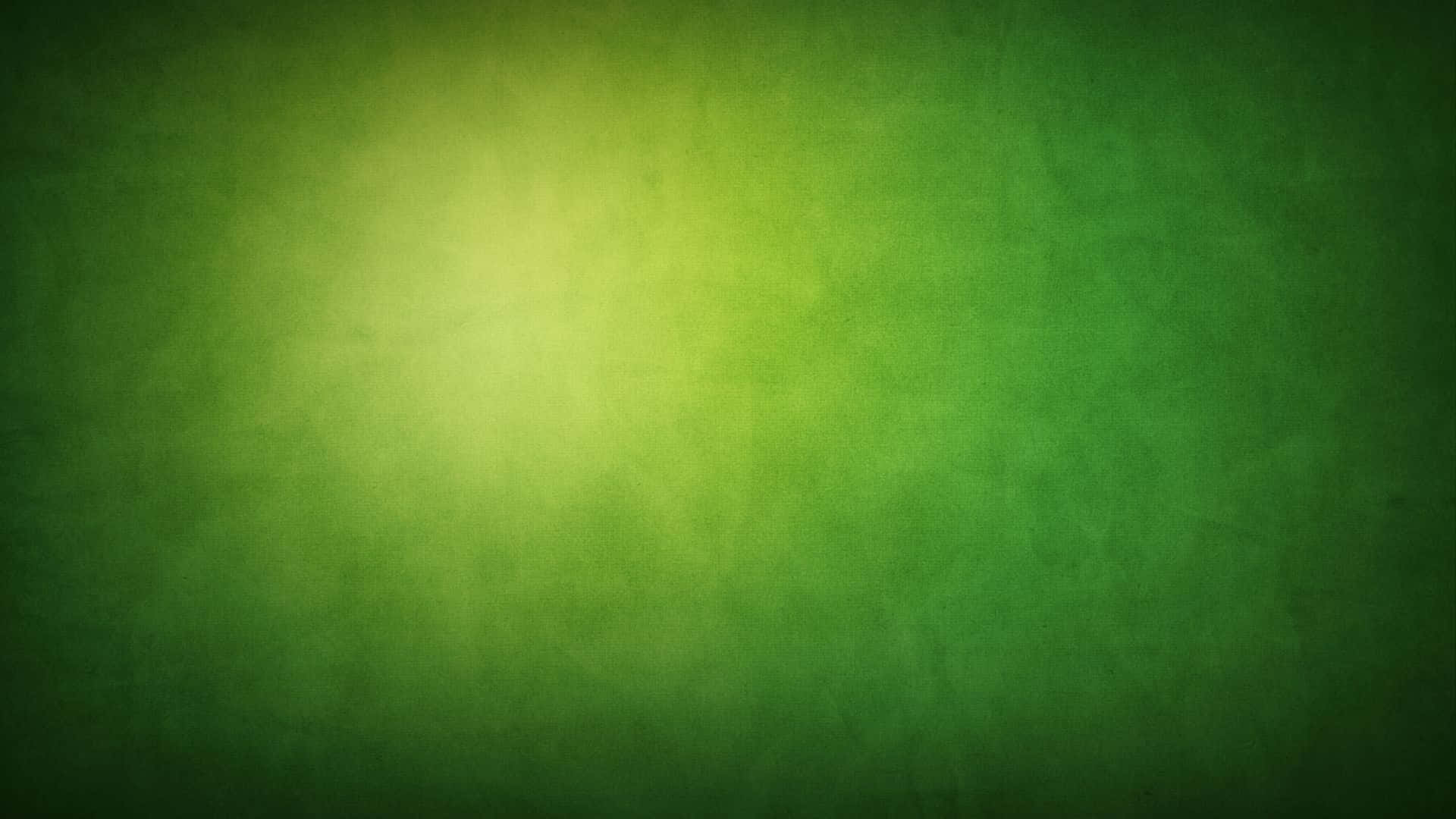 Cute Green 桌布 壁紙 — 帶有紋理的綠色漸變背景，中央有柔和的黃色光芒。
