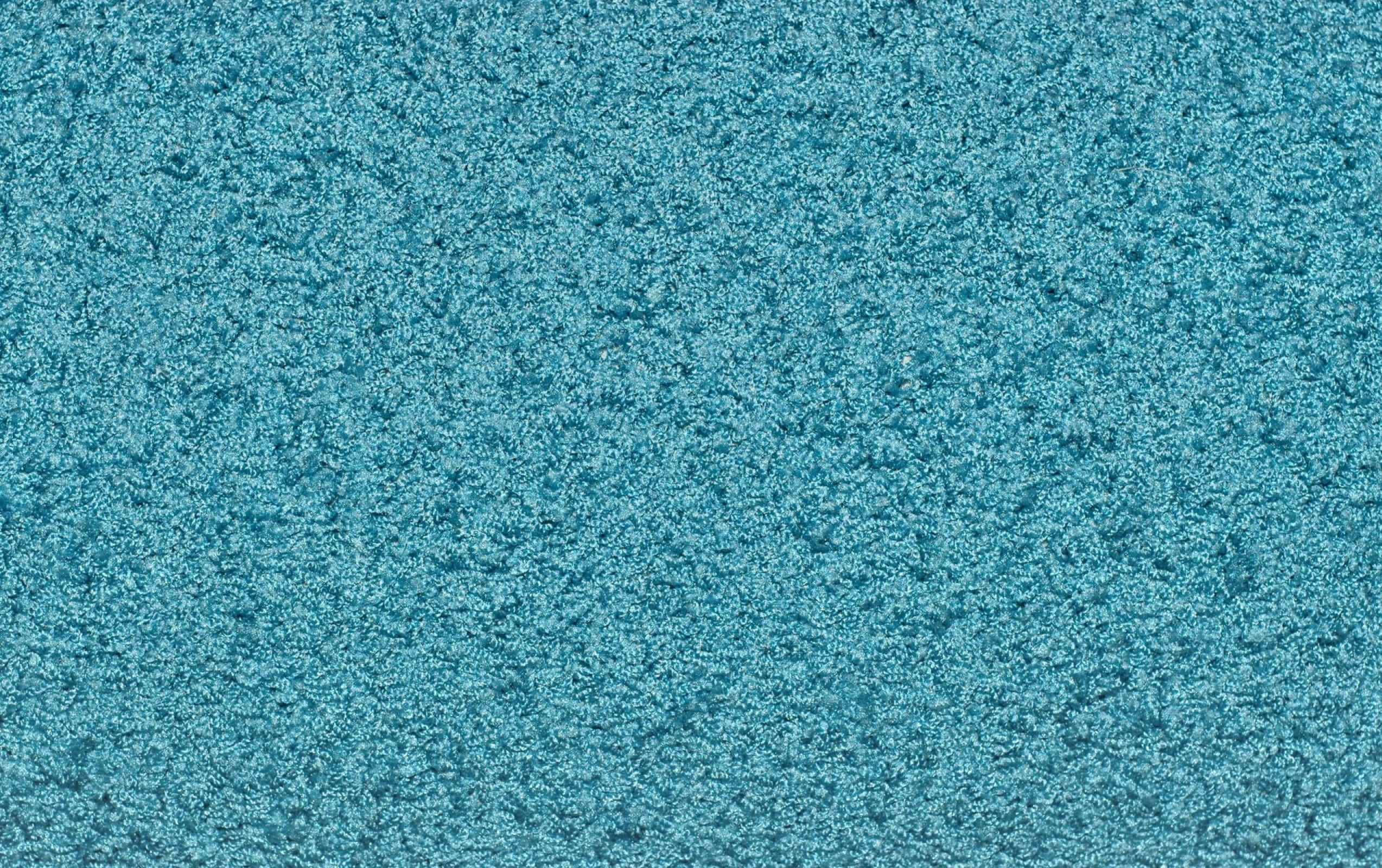 Carpet 桌布 壁紙 — 帶有紋理的青綠色地毯特寫，表面柔軟毛絨，顏色變化細微。
