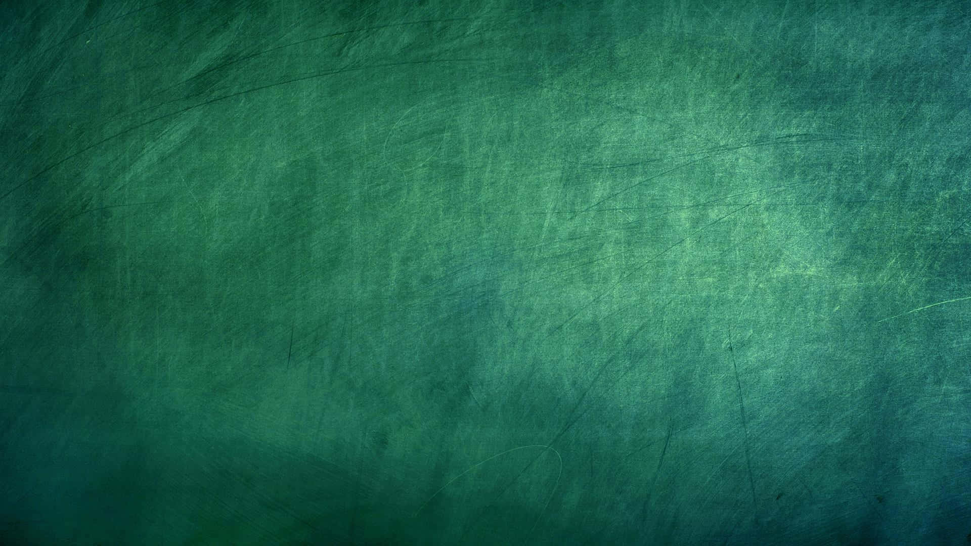 黑板 桌布 壁紙 — 帶有細微刮痕和漸變照明的紋理青綠色表面，營造出復古磨損效果。