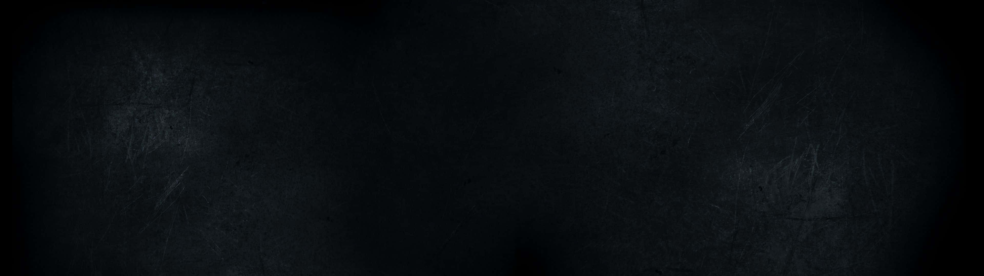 Minimalist Dual Monitor 桌布 壁紙 — 帶有細微刮痕和顆粒狀瑕疵的深色紋理黑色背景。