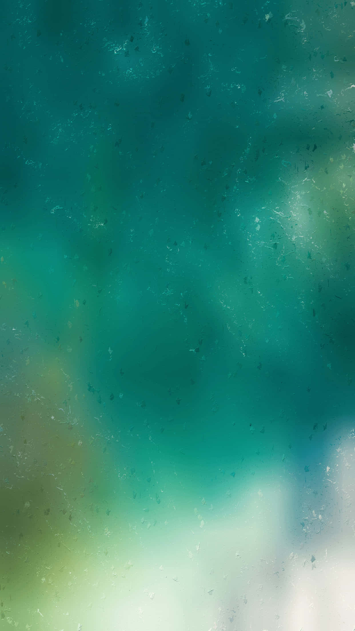 iPhone 桌布 壁紙 — 帶有細微斑點和柔和光線擴散的紋理青綠色和綠色漸變背景。