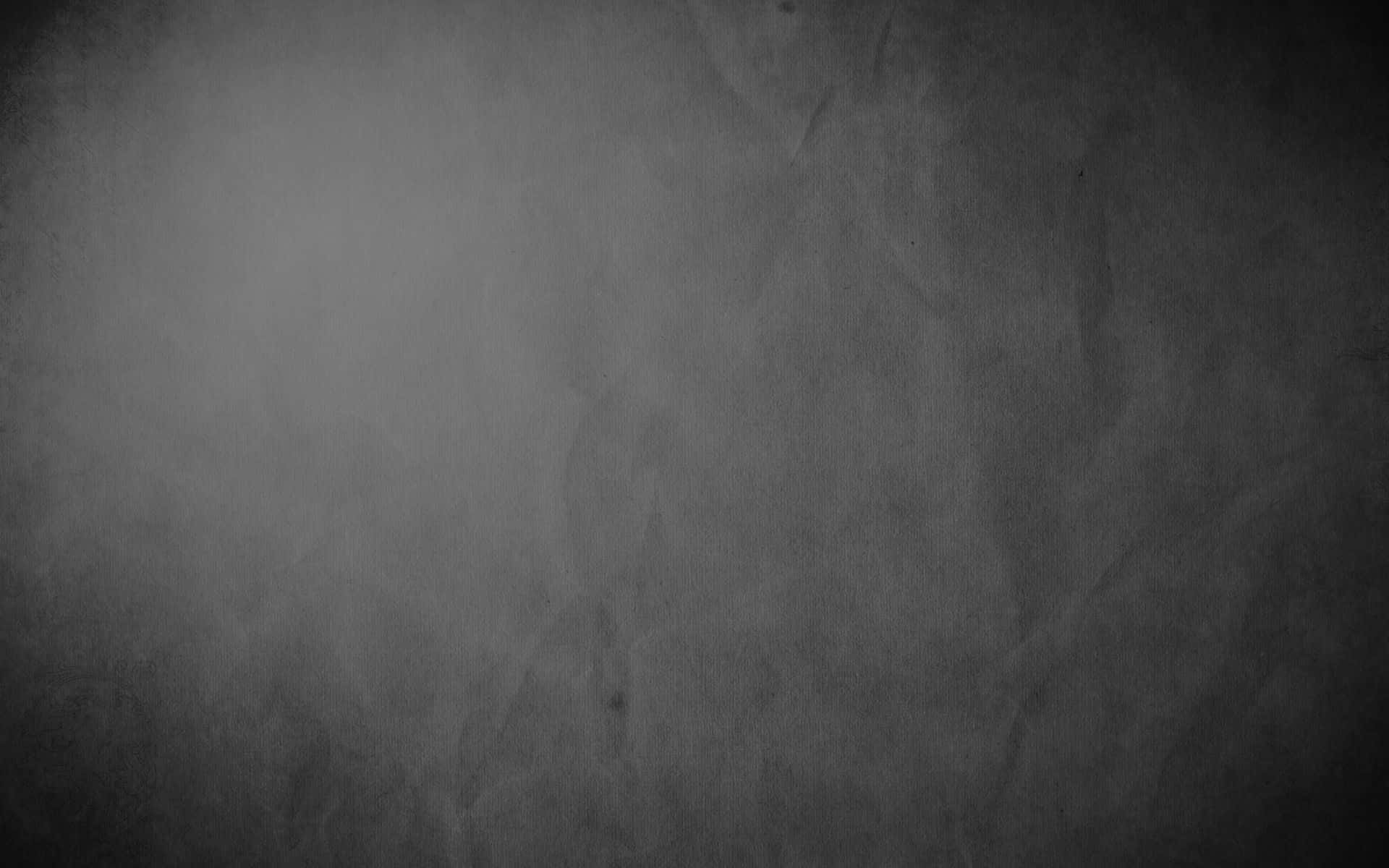 Aesthetic Black Grunge 桌布 壁紙 — 帶有細微皺褶和漸暗邊緣暈影效果的紋理灰色紙張表面。