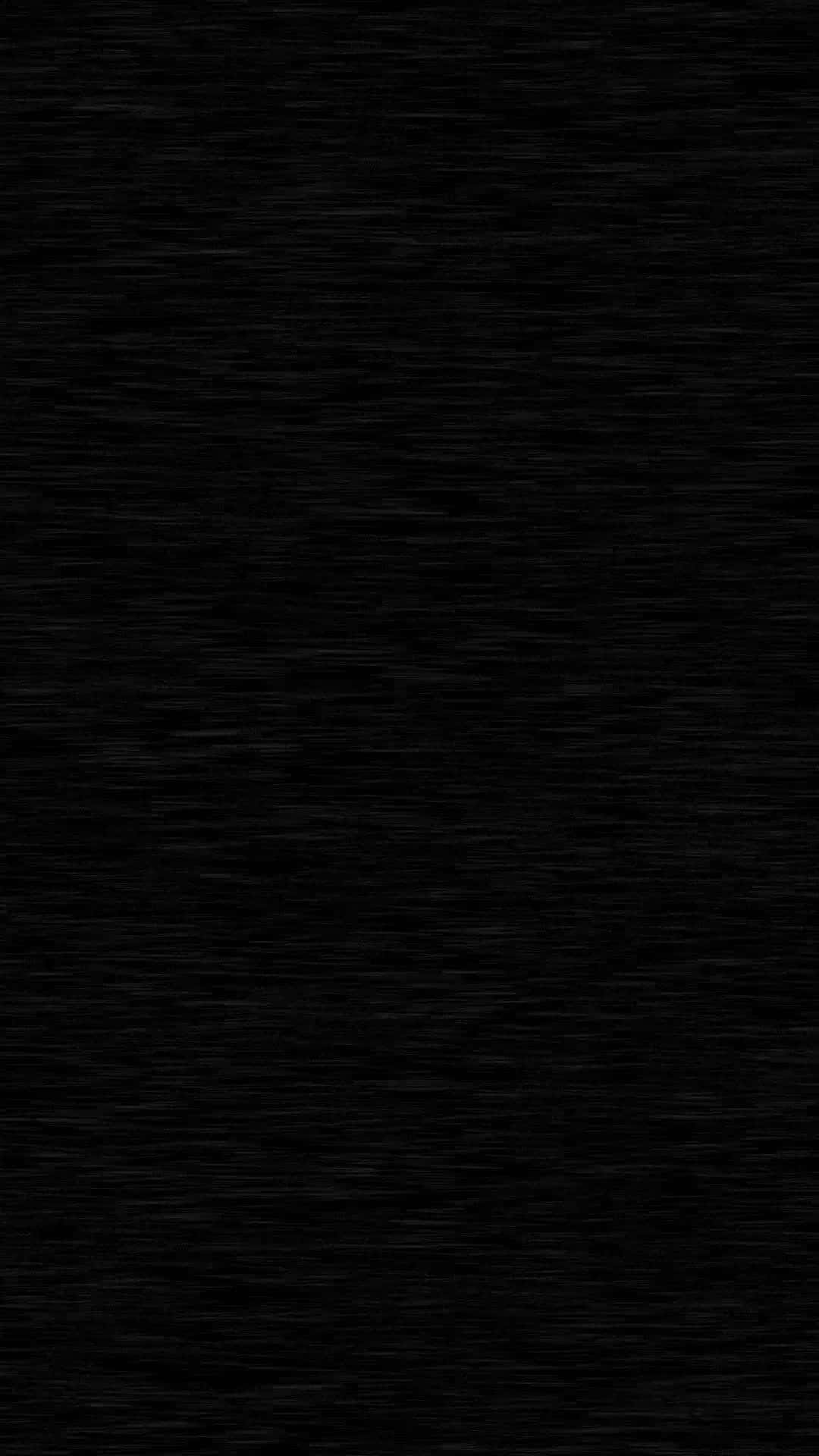simple dark aesthetic 桌布 壁紙 — 帶有細膩水平筆觸的紋理黑色背景，營造出極簡抽象圖案。