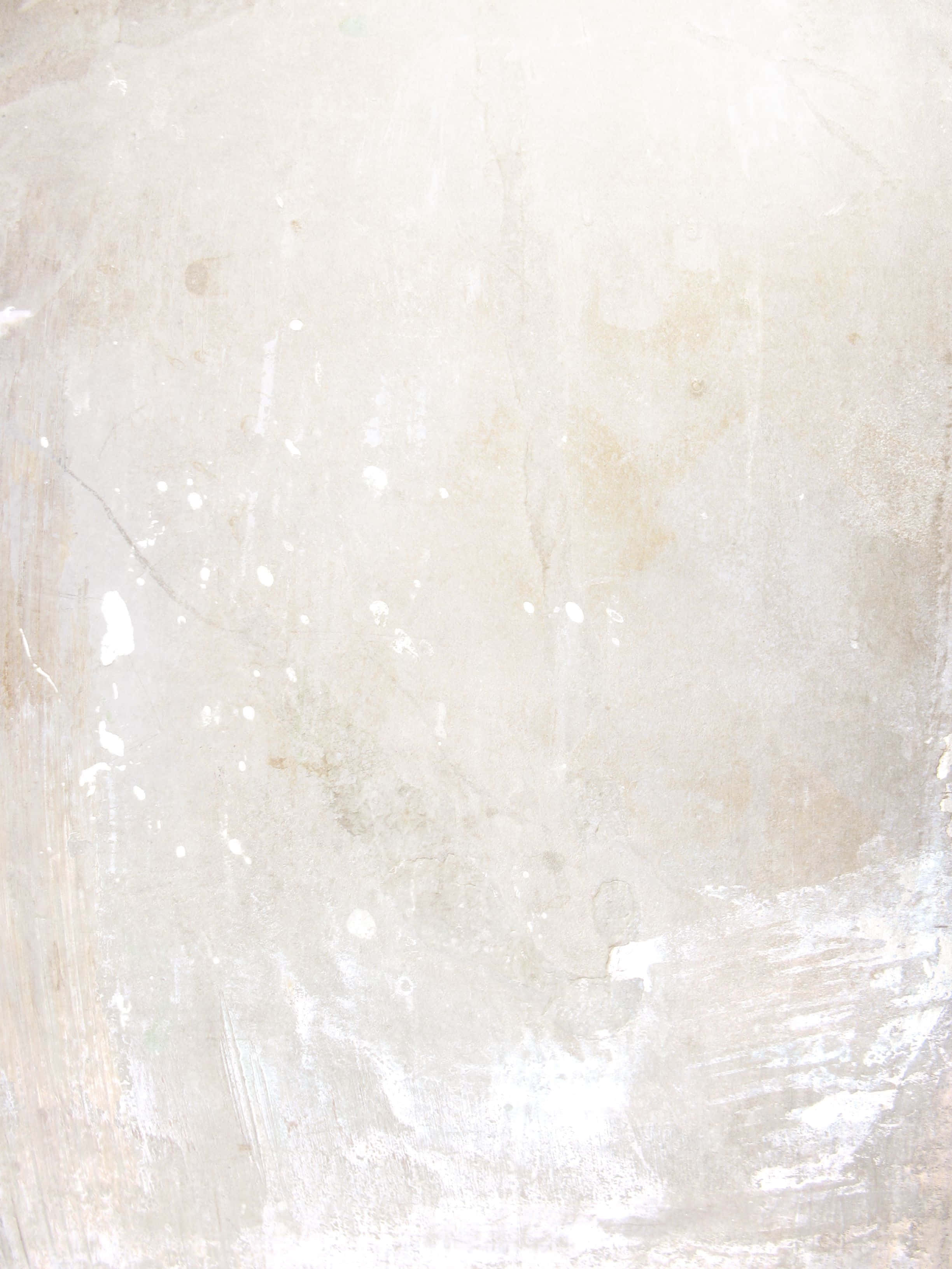 White Marble 桌布 壁紙 — 帶有細膩米色污漬和白色油漆飛濺的紋理米白牆壁，營造出質樸破舊的外觀。