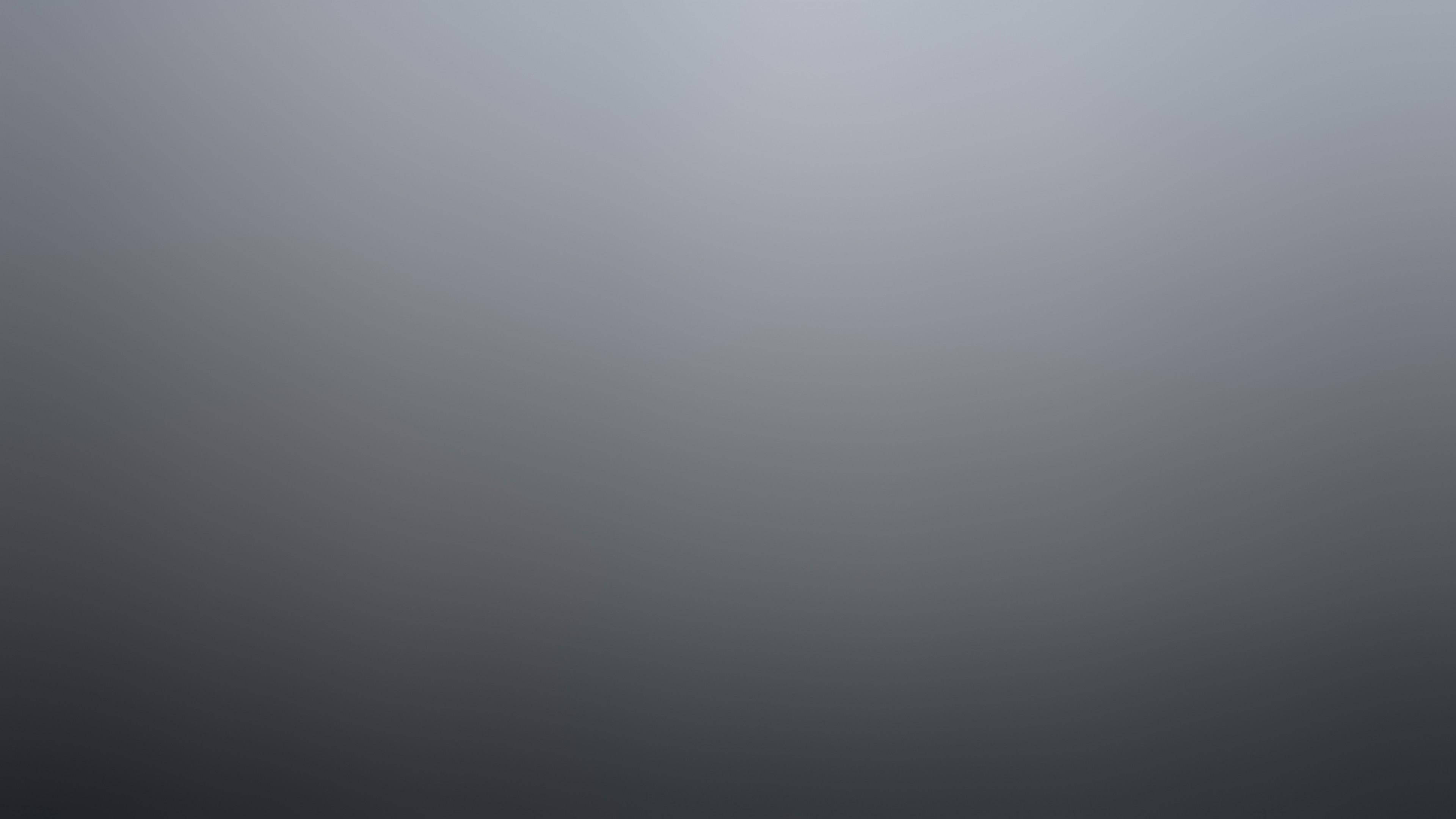 Gradient 桌布 壁紙 — 平滑漸變背景，從頂部的淺灰色過渡到底部的深炭灰色。
