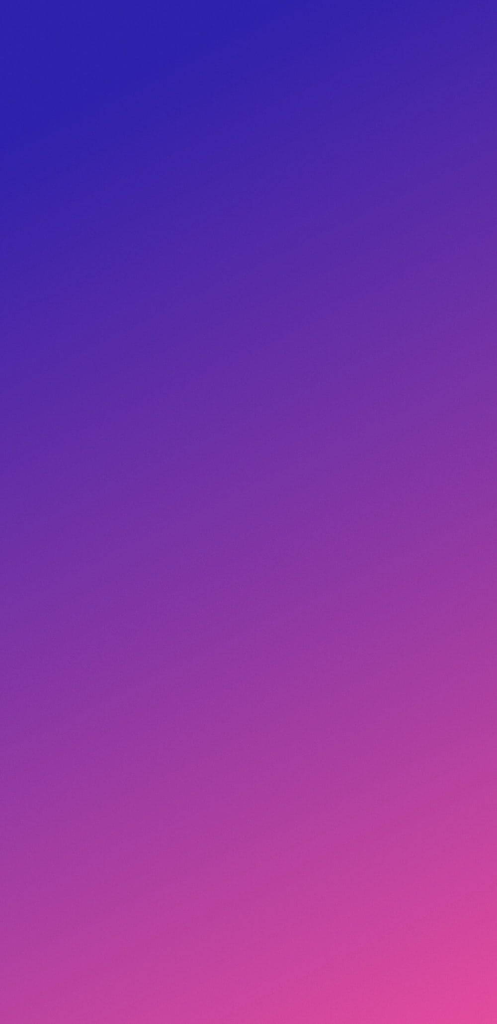 iPhone 美學 桌布 壁紙 — 平滑的垂直漸變從頂部的深藍色過渡到底部的鮮豔粉紅色。