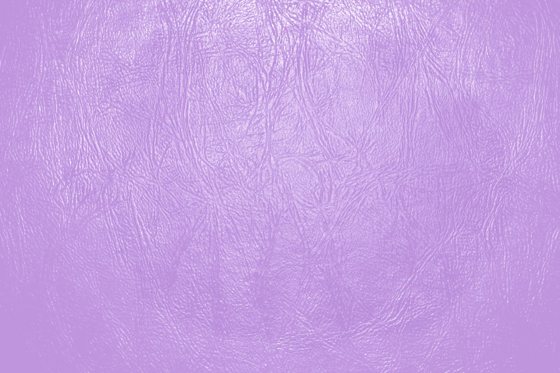 Purple Leather 桌布 壁紙 — 平滑的薰衣草色表面，帶有細微裂紋紋理，類似乾掉的油漆或老化的乙烯基。